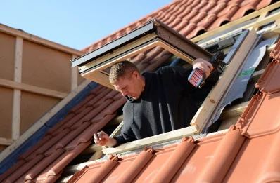 Pose de fenêtres de toit Velux à la Quarte